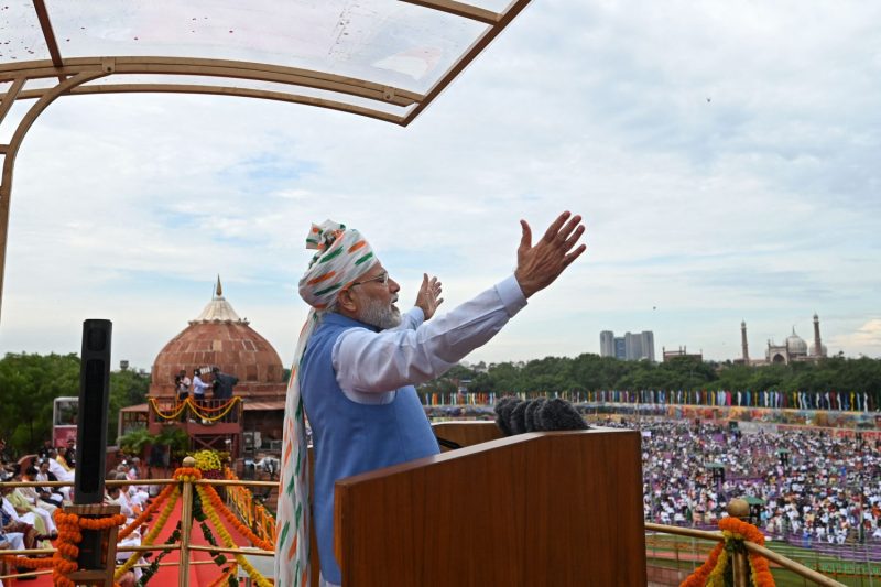 Indias Prime Minister Narendra Modi addresses the nation from the ramparts of the Red Fort during the celebrations to mark countrys Independence Day in New Delhi on August 15, 2022. - India marked the 75th anniversary of independence on August 15 with Modi giving a speech from Delhi's historic Red Fort, hung with freedom fighters' pictures and guarded by robot elephants. (Photo by Money SHARMA / AFP) (Photo by MONEY SHARMA/AFP via Getty Images)