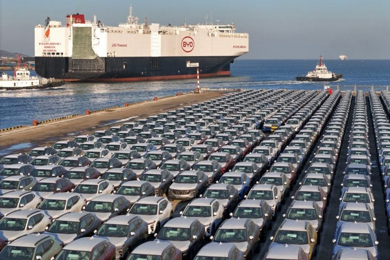 Electric cars are waiting to be loaded onto a cargo ship for export at a port facility in Yantai, China, on Jan. 10.