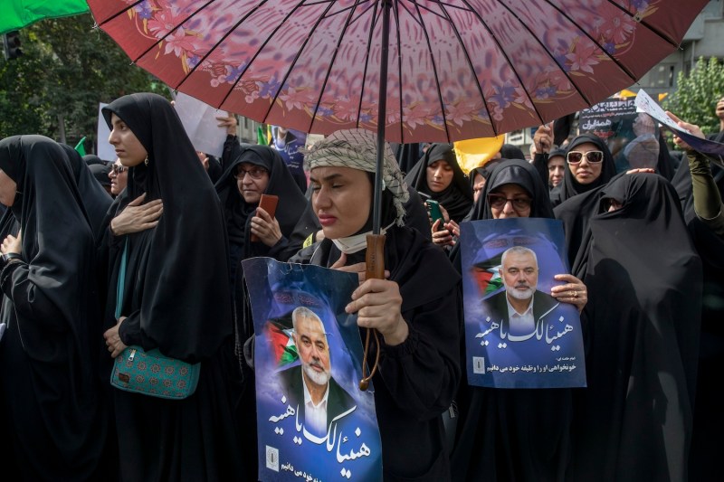 Iranians attend a funeral ceremony held for Hamas political chief Ismail Haniyeh on Aug. 1 in Tehran.