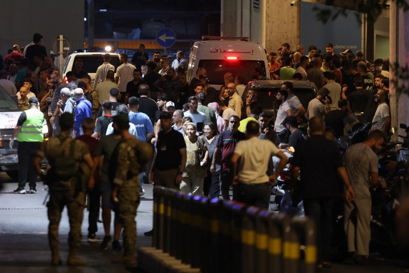 People gather at the entrance of the American University of Beirut Medical Center.