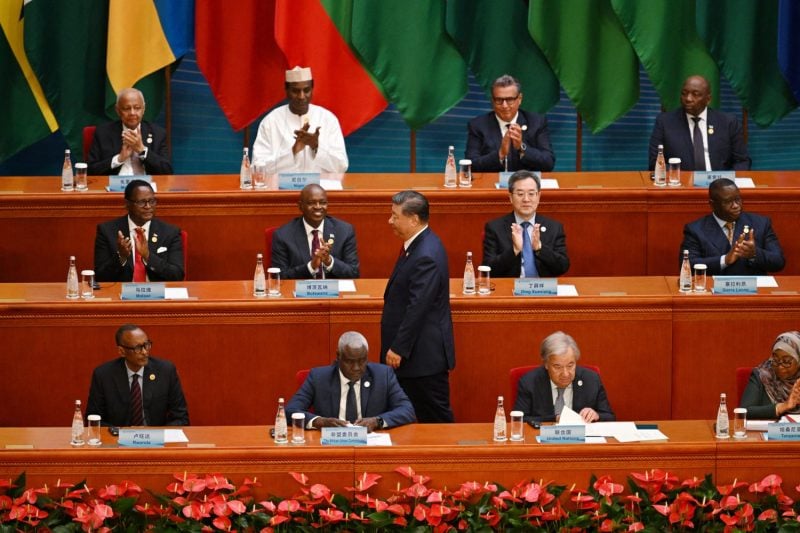 Chinese President Xi Jinping walks to the podium to speak at the Forum on China-Africa Cooperation at the Great Hall of the People in Beijing on Sept. 5.