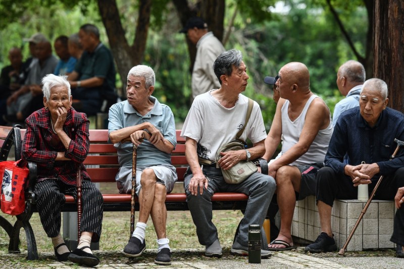 Elderly people rest at a park in Fuyang, China, on Sept. 13.