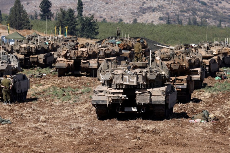 Israeli troops deploy in an area in the Upper Galilee region in northern Israel on Sept. 27.