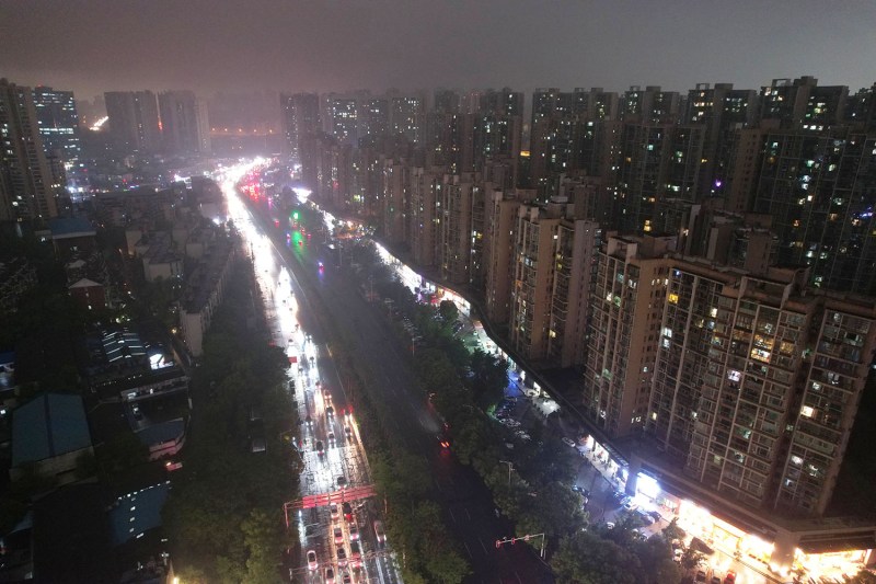 Dark clouds hang over the skyline of Changsha, China, on April 29.