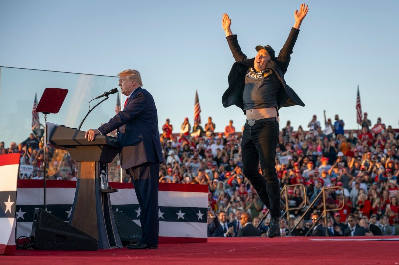 Elon Musk jumps on stage as he joins Donald Trump during a campaign rally at site of his first assassination attempt in Butler, Pennsylvania, on Oct. 5.