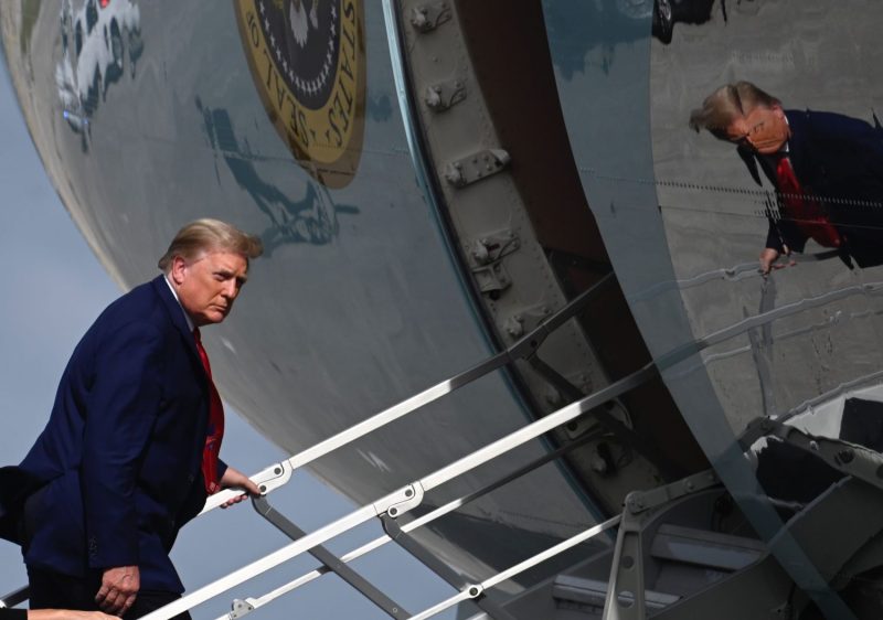 U.S. President Donald Trump boards Air Force One at Palm Beach International Airport in West Palm Beach, Florida, on Dec. 31, 2020.