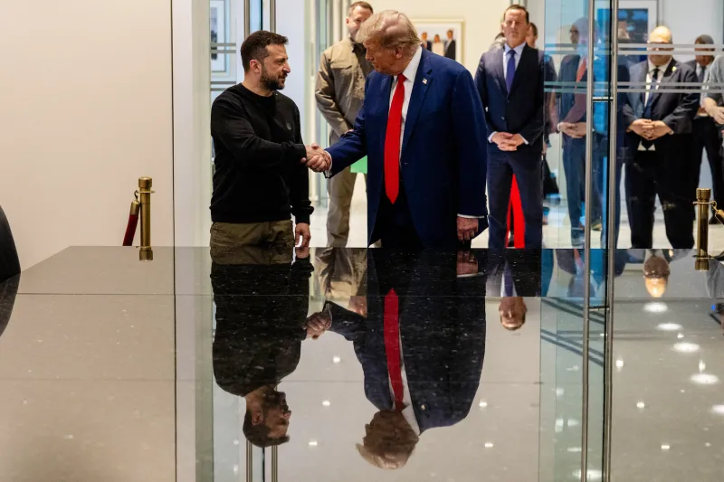 Former U.S. President Donald Trump and Ukrainian President Volodymyr Zelensky shake hands in New York City on Sept. 27.