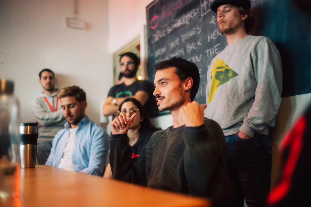 freiheit.com employees at a meeting