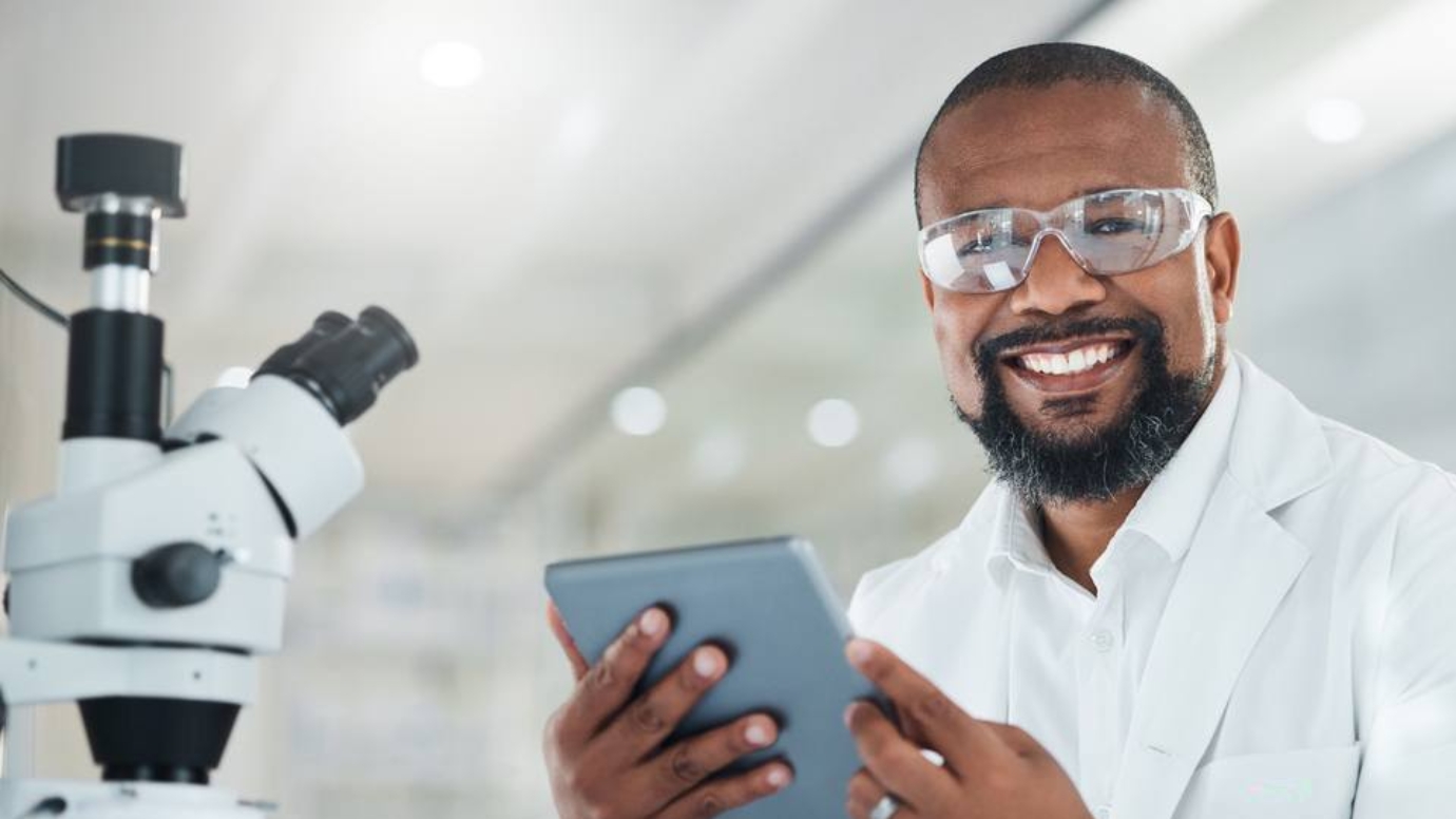 Researcher holding a tablet in the lab