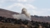 Smoke billows from the site of an Israeli airstrike that targeted an area in the southern Lebanese village of al-Taybeh on Sept. 19, 2024. 