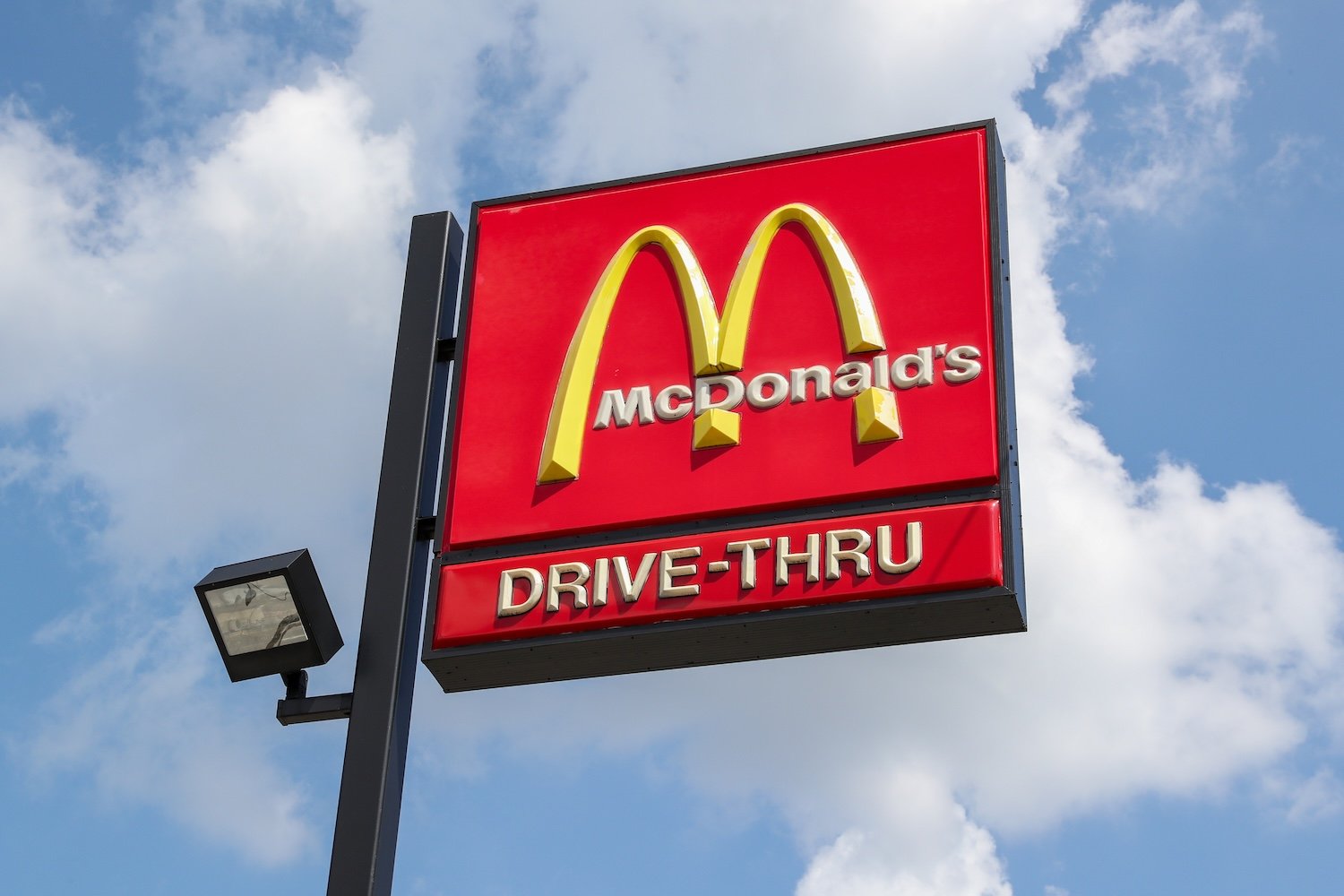 The McDonald's logo is seen on a sign outside the fast food restaurant.