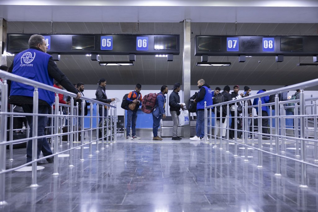 From file: The IOM often helps with relocations and returns from one EU country to another or to the home country of migrants. In this case Bangladeshi migrants are helped to leave Libya | Photo: IOM Libya's X account @IOM_Libya