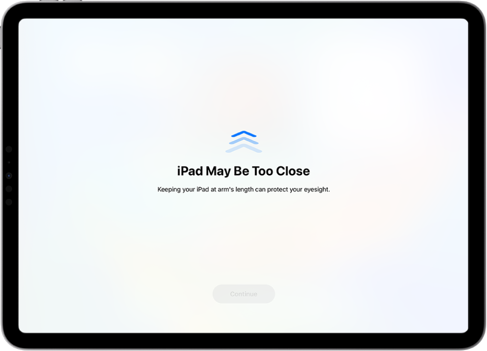 A screen with a warning that iPad is too close and a suggestion to keep iPad at arm’s length. When iPad moves farther away, the Continue button at the bottom appears so you can return to the previous screen.