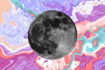 a full moon on a colorful background