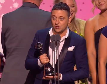 ash palmisciano accepts serial drama award at ntas