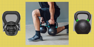 person performing a lunge while holding two kettlebells