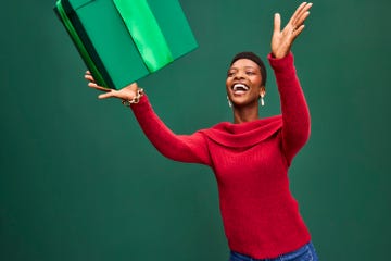 woman catching holiday gift