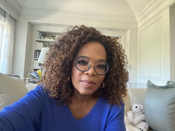 oprah in glasses and blue sweater