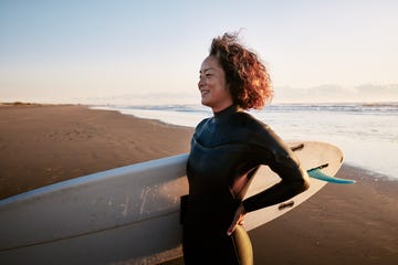 woman surfing