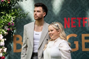 british actor luke newton and irish actress nicola coughlan attend the italian presentation of the third season of bridgerton milan italy, may 8th, 2024 photo by elena di vincenzoarchivio elena di vincenzomondadori portfolio via getty images