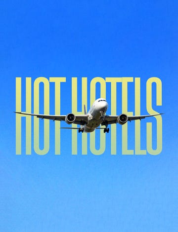 a commercial airplane is flying through a clear blue sky positioned towards the viewer bold yellow text states hot hotels