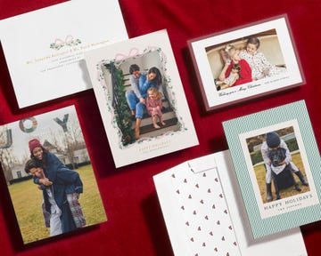 a collection of holiday greeting cards featuring festive designs and family photographs the cards include a message of 'happy holidays' and are adorned with decorative elements, such as bows and seasonal motifs some cards display family scenes with individuals and pets, while others are simply styled with artistic text and colors