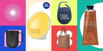 collection of various gift items including a smart mug a sunrise alarm clock bluetooth speaker a handbag and hand cream