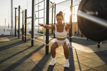 woman doing a squat