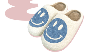 cozy house slippers with a smiling face design