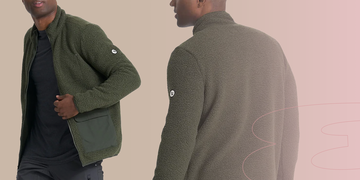 a model showcasing a green fleece jacket with a zip front