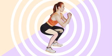 woman doing squat workout on patterned background