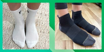 a person's feet wearing black and white socks