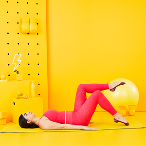 Yellow, Leg, Human leg, Orange, Stomach, Physical fitness, Swiss ball, Thigh, Arm, Knee, 