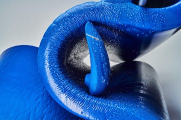 closeup of textured blue objects with water droplets