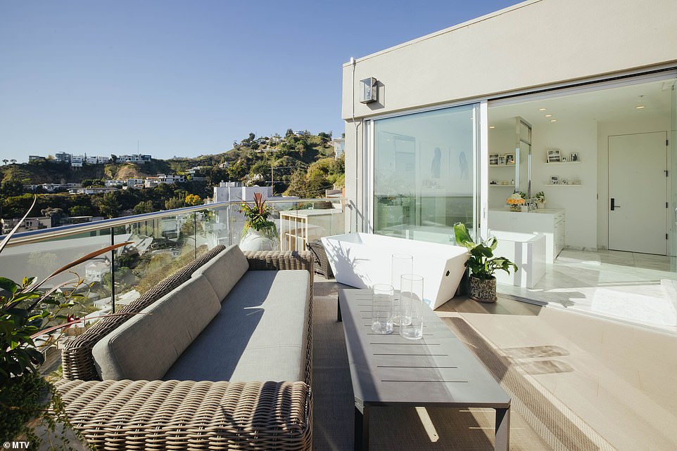 Open area: The bathroom leads out into a balcony where the singer has a plunging ice bath, and another outdoor seating area