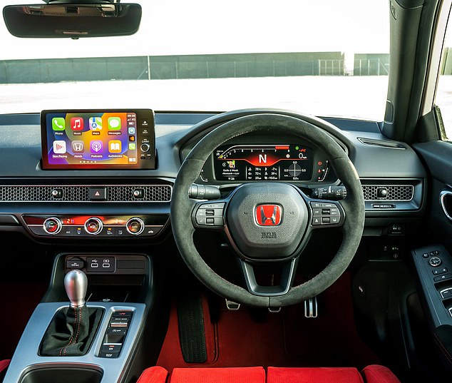 There's even a narrow strip of lights on the top of the 10.2-inch dashboard display which illuminate in a strip to match your red-lining revs