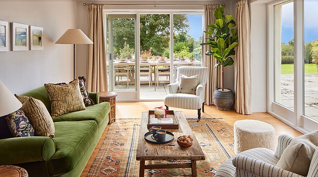 The sitting room is set on stone flags, with window seats offering more picturesque views down the South Lakeland Valley