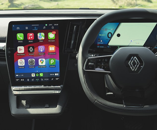 The fabric-topped dashboard has a 12-inch multi-media screen and 12.3-inch driver display