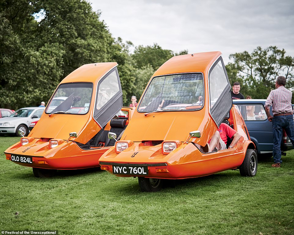 A pair of Bond Bug three-wheelers. Reliant built these two-seater, wedge-shape micocars from 1970 to 1974. They famously feature a lift-up canopy and side screens instead of conventional doors