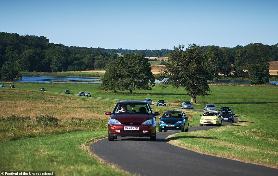 A fleet of first-generation Ford Focus arrive at the show. The model launched in 1998, meaning it just squeezes into the unexceptional era