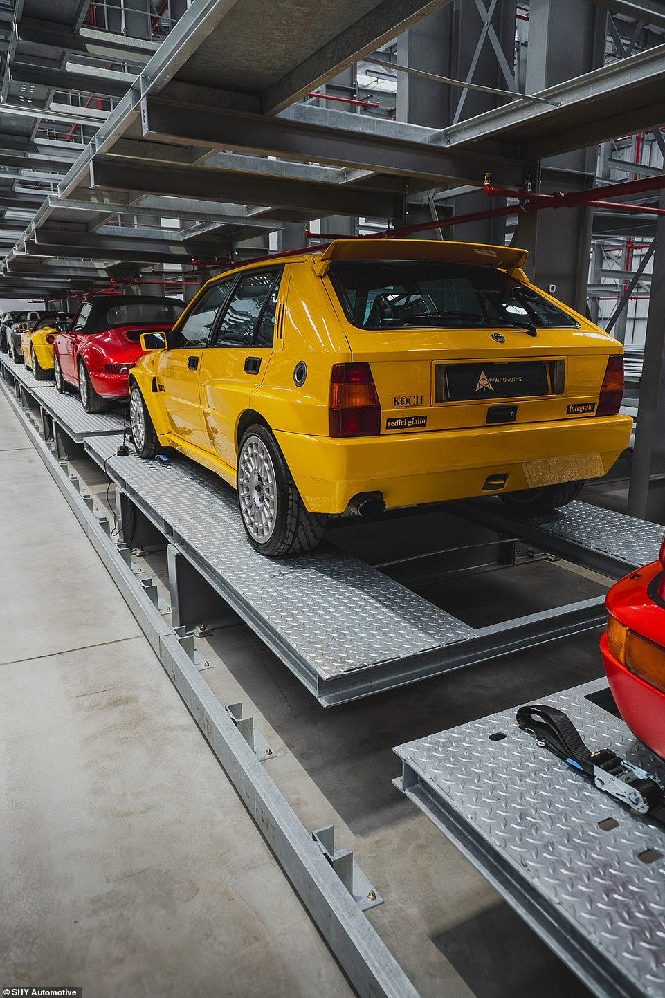 A strict privacy policy is in place that guarantees restricted access to the main vehicle vault. Anyone employed to work there must pass a rigorous vetting process, too. Employees also need to provide their fingerprint recognition on entry. The selection on motors in storage already includes this beautiful Lancia Delta Integrale HF Evo II