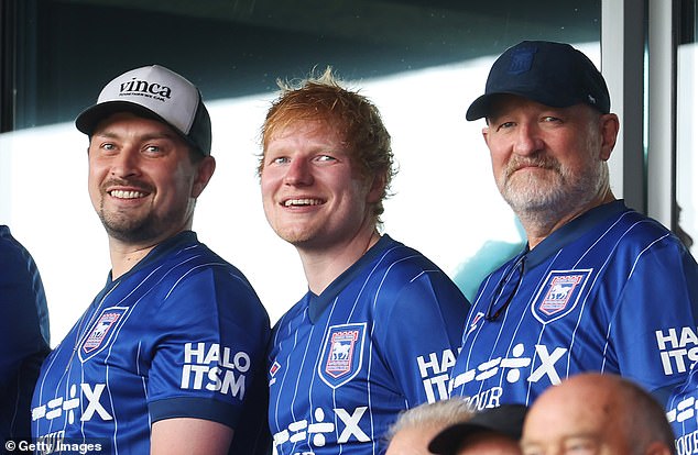 Music star Ed Sheeran (centre) was among the Portman Road crowd but he left at half-time