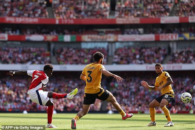 Saka (left) doubled the scoring and provided an assist to down Wolves at the Emirates on Saturday