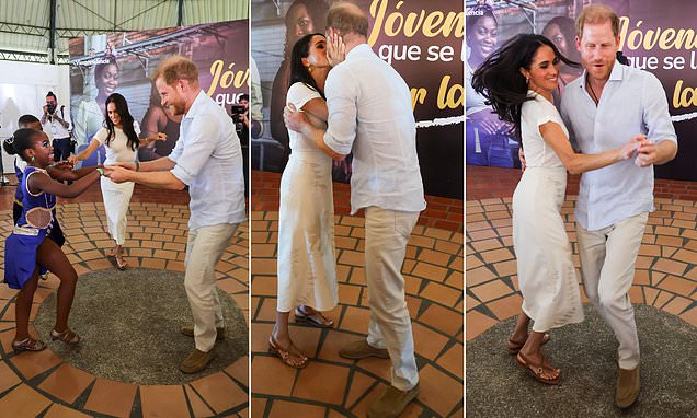 Prince Harry and Meghan Markle share a kiss as they show off their dance moves in sweet