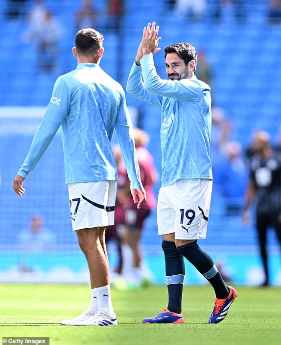 MANCHESTER, ENGLAND - AUGUST 24: Ilkay Guendogan of Manchester City applauds as he warms up prior to the Premier League match between Manchester City FC and Ipswich Town FC at Etihad Stadium on August 24, 2024 in Manchester, England. (Photo by Michael Regan/Getty Images)