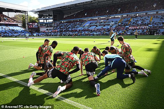 BIRMINGHAM, ENGLAND - AUGUST 24: Players of Arsenal warm up prior to the Premier League match between Aston Villa FC and Arsenal FC at Villa Park on August 24, 2024 in Birmingham, England. (Photo by Stuart MacFarlane/Arsenal FC via Getty Images)