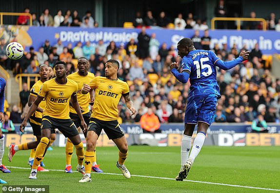 WOLVERHAMPTON, ENGLAND - AUGUST 25: Nicolas Jackson of Chelsea scores his team's first goal during the Premier League match between Wolverhampton Wanderers FC and Chelsea FC at Molineux on August 25, 2024 in Wolverhampton, England. (Photo by David Rogers/Getty Images)