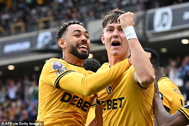 Matheus Cunha (left) and Jorgen Strand Larsen (right) scored for Wolves during the first half