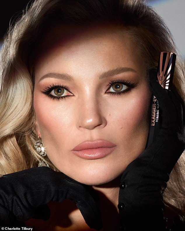 The supermodel, who turned 50 in January, wore heavy black eyeliner whilst she stared into a mirror