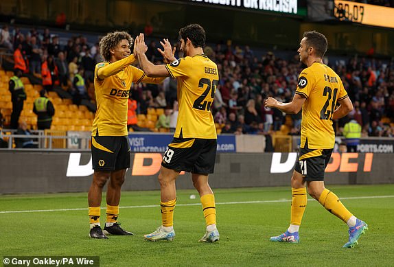 Wolverhampton Wanderers' Goncalo Guedes celebrates scoring their side's first goal of the game during the Carabao Cup second round match at Molineux Stadium, Wolverhampton. Picture date: Wednesday August 28, 2024. PA Photo. See PA story SOCCER Wolves. Photo credit should read: Gary Oakley/PA Wire.RESTRICTIONS: EDITORIAL USE ONLY No use with unauthorised audio, video, data, fixture lists, club/league logos or "live" services. Online in-match use limited to 120 images, no video emulation. No use in betting, games or single club/league/player publications.